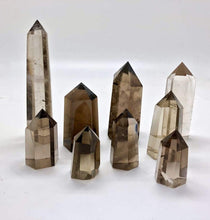 Load image into Gallery viewer, Smokey Quartz  point: Protective and Grounding
