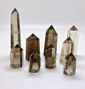 Smokey Quartz  point: Protective and Grounding